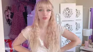 Here is a blonde with blue eyes and perfect body changing outfits