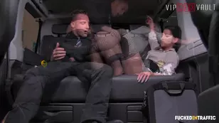 A sexy girl is having fun with her feet in the limousine