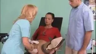 Sexual a doctor examines the European girl in a clinical setting