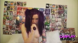 A nerdy girl with a purple hair does not forget about the fun