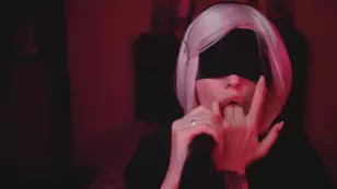 Nerd in cosplay gets fucked by a sex machine inspired by Yorha B
