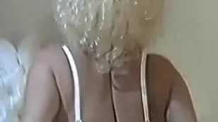 Two mature women having a threesome with some young guys is a classic scene