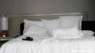 Young Christian reads a book in the sitting room when a black girl comes