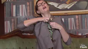 A mature porn star is depicted in old fashioned attire in this vintage flash